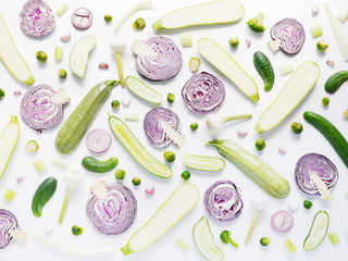 Fresh vegetables in a cut on a white background. Pattern from vegetables. Food background. Cut red cabbage. 