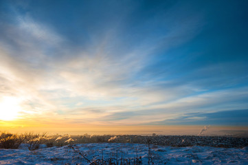 A beautiful winter dawn. Amazing sunset and the view is not the city from the mountain. Saratov, Russia