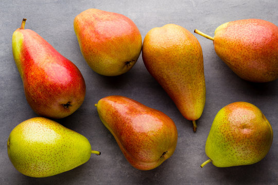 Pears isolated on the gray background.