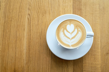 Cup with coffee on the table. Concept and idea for resting time