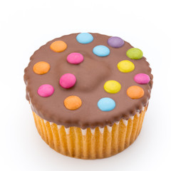 Multiple colorful decorated muffins on a white background.