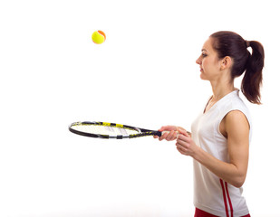 Woman playing with tennis racquet
