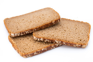 Slices of rye bread isolated on white background.