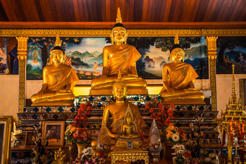 Obraz premium Thai temple interior with Buddha. Wat Patong Suwankeereewong Temple Phuket, Thailand.