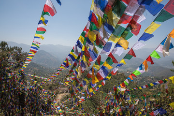 Colorful prayer flag mountain near ancient and holy Namobuddha monastery. Dhulikhel, Nepal.