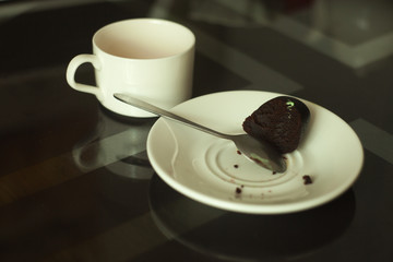 a cup of coffee on table . Simple breakfast or coffee break in morning