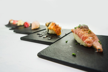 Mixed sushi nigiri on white background