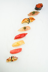 Mixed sushi nigiri on white background