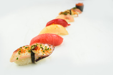 Mixed sushi nigiri on white background
