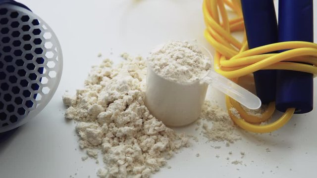 sports nutrition and supplements in bodybuilding close-up. Protein and servings for sports. Protein powder, close-up