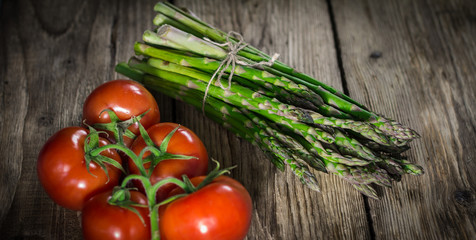 Asparagus  on vintage wooden background. place for text