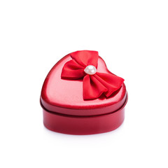 Red heart metal box on white background
