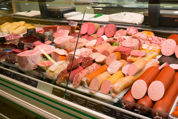 Variety of Cold Cuts and Sausages in a Deli Counter © toswon