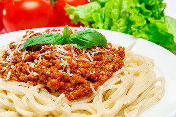 Spaghetti bolognese on a white plate