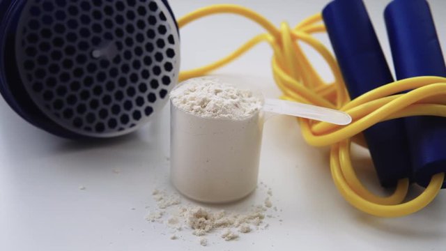 sports nutrition and supplements in bodybuilding close-up. Protein and servings for sports. Protein powder, close-up