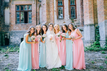 Beautiful bride with her pretty bridesmaids