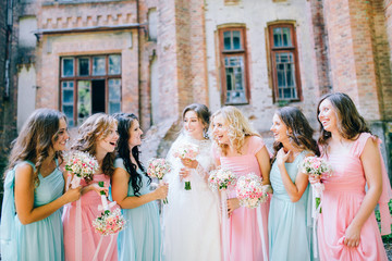 Beautiful bride with her pretty bridesmaids