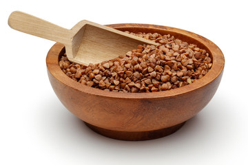 Buckwheat in wooden bowl with scoop