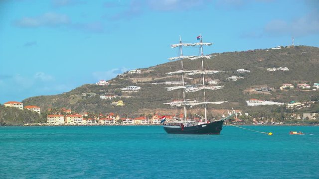 Philipsburg St. Maarten Sailboat Anchored in Great Bay in an Exotic Setting with Tropical Blue Water and Colonial Building in the Mountain Background