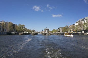 Fototapeta premium Canal and canalhouses in Amsterdam in the Netherlands