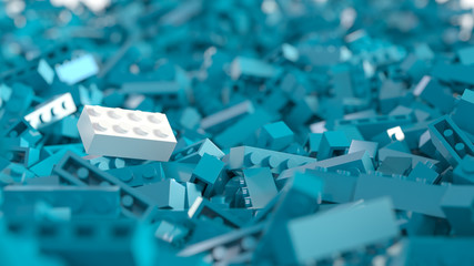 White piece on pile of blue bricks
