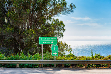 Naklejka premium Directional Signs along Highway 1 in Big Sur California