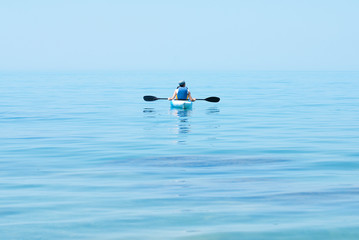 Fototapeta na wymiar Kayak Water Sport - Kayaking on the Sea - Active Healthy People
