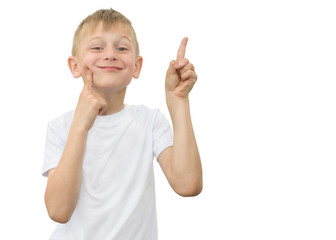Emotional blond boy in a white shirt with a gray sheet of paper for notes on a white background