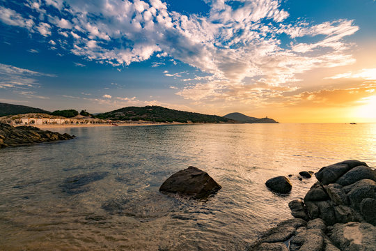 Sunrise on the beach of Chia, Sardinia, Italy. © isaac74