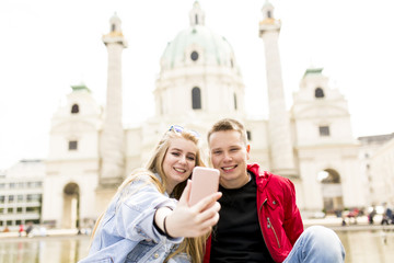 Young couple taking selfie in Vienna, Austria