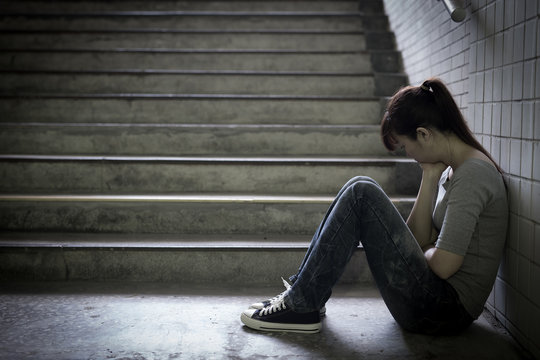 depressed woman in underground