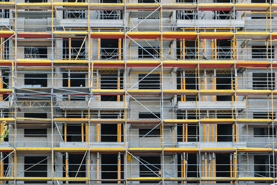 scaffolding on facade,  building under construction