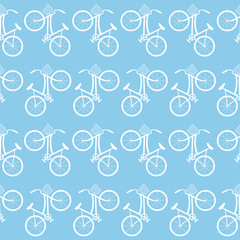 Obraz premium White contours of bicycle on a blue background. Seamless pattern. Great for wrapping paper, posters, backgrounds for the site.