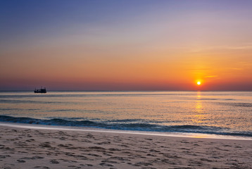 Tropical beach at sunset.