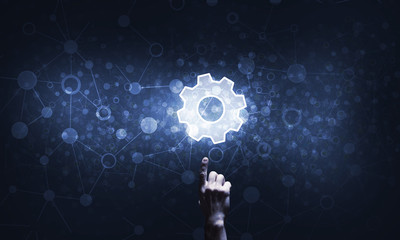 Technology conceptual image with gear digital symbol on dark background