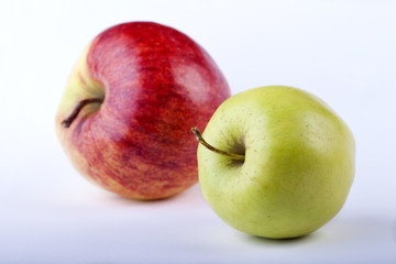 Fototapeta na wymiar two apples on the white background
