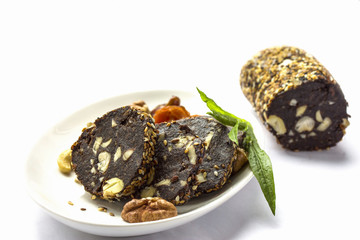 Chocolate cut sausage with dried fruits and nuts
