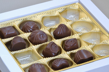 Chocolate candies in incomplete box