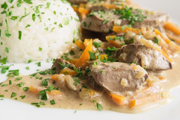 turkey liver with rice sprinkled with parsley