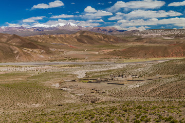 Fototapeta na wymiar Small village in the middle of vast altiplano, Bolivia