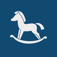 Horse toy icon on the blue background.