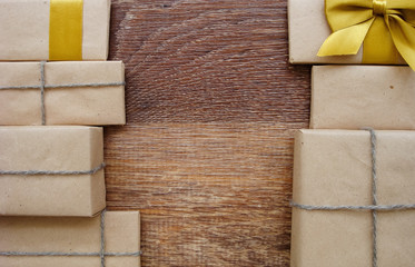 Gift or parcel on a wooden background