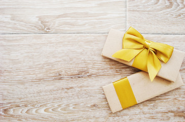 Gift or parcel on a wooden background