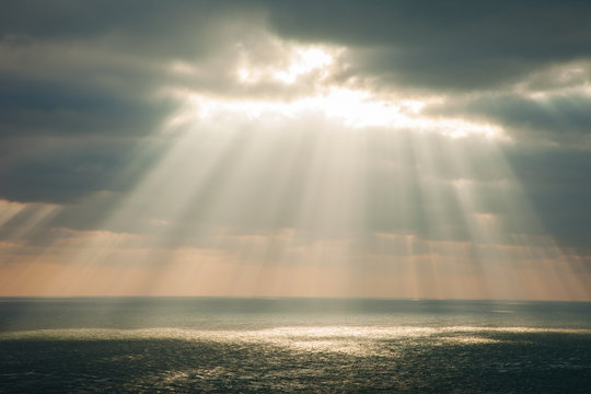 Stairway to Heaven in Cloudy Sky with Sunlight Rays Shining Down