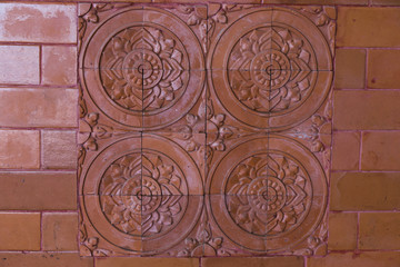 Beautiful tiles on the wall of clay