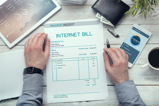 Internet Bill  Invoice On The White Table.