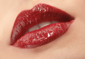 Woman with red lips close up