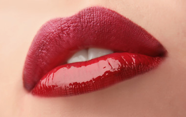 Woman with red lips close up