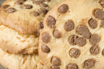 Chocolate chip cookies on rustic wooden background