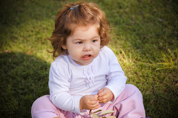 Portrait of baby girl in park